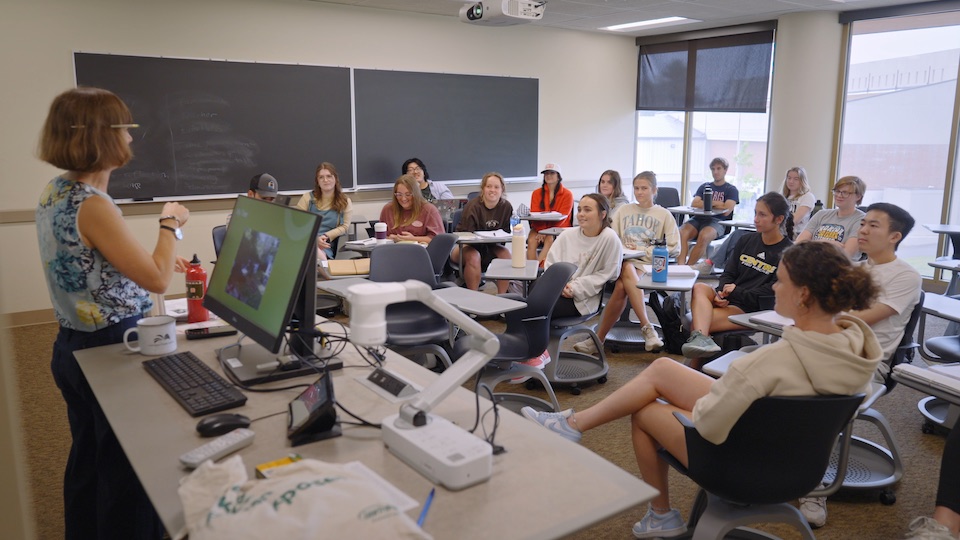 Ellen teaching a classroom